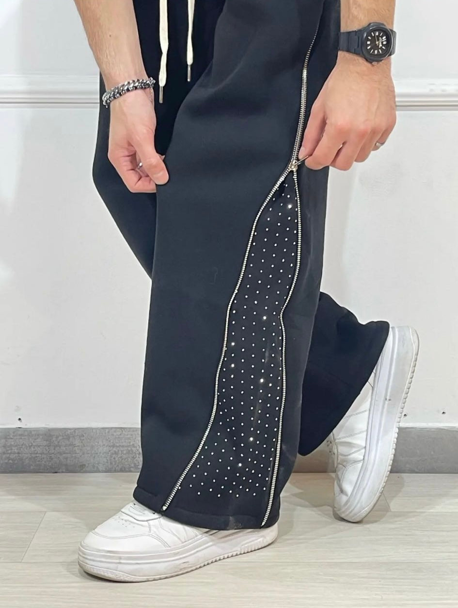 Panta tuta con zip laterale