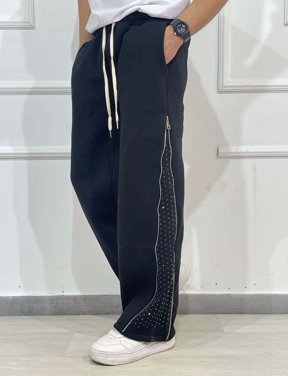 Panta tuta con zip laterale